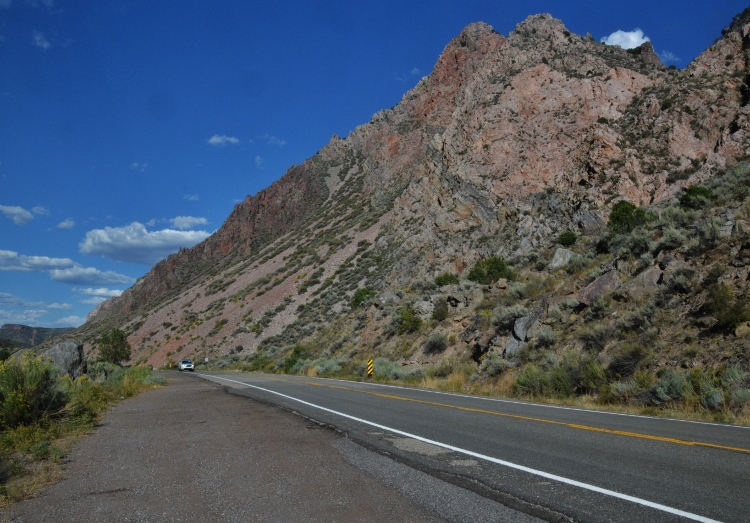 view of the road with tall cliff